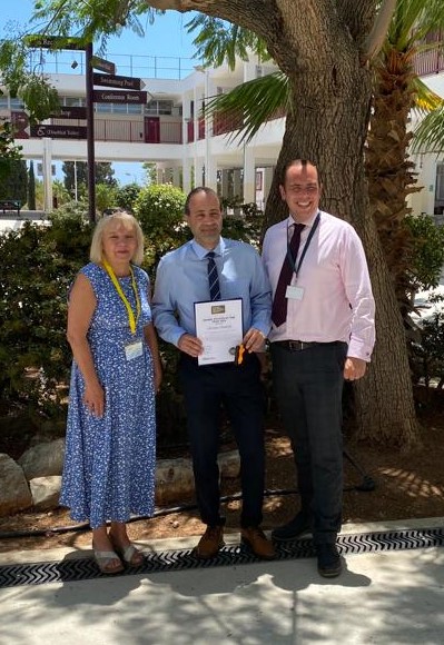 Jean with Christos and Colin Guyton (headteacher at St. John's School, Cyprus)